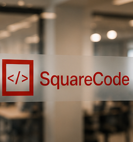 SquareCode logo on frosted glass in the office